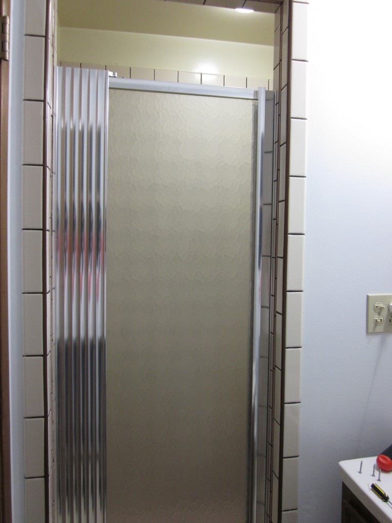 The door was so small even I could barely fit through it. It HAD to go.